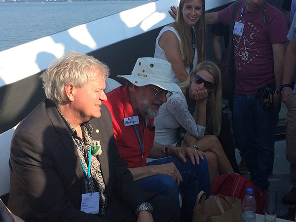 Nobel laureates Brian Schmidt and Bill Phillips enjoy some time out on the water with Lindau meeting attendees. Credit - Alaina Levine