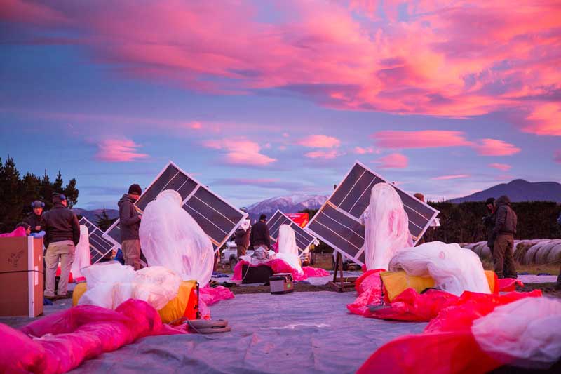 The Project Loon team prepares solar panels, electronics and balloon envelopes for launch as the sun rises in New Zealand. Photo courtesy of Project Loon / X.