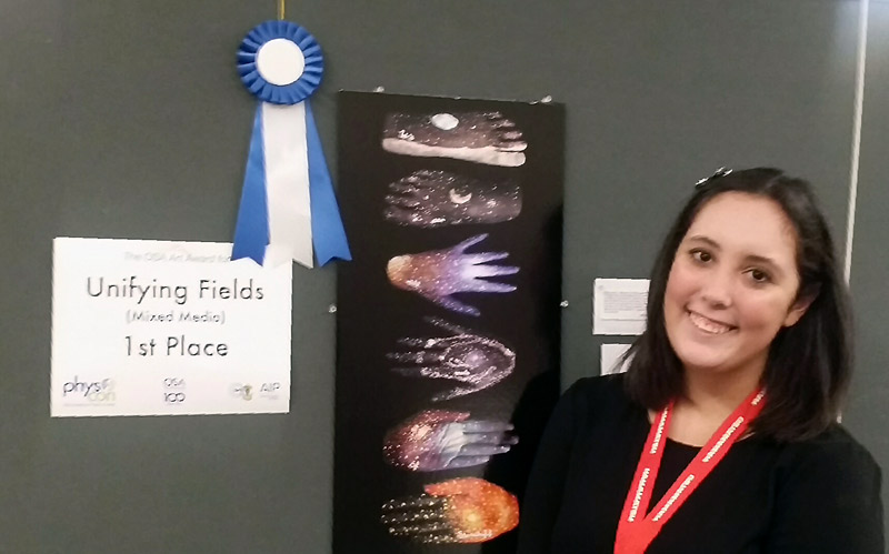 Jordan Rice, Carthage College, is pictured with her piece &quot;We are all made of starstuff,&quot; which won first place in the Unifying Fields (Mixed Media) category.