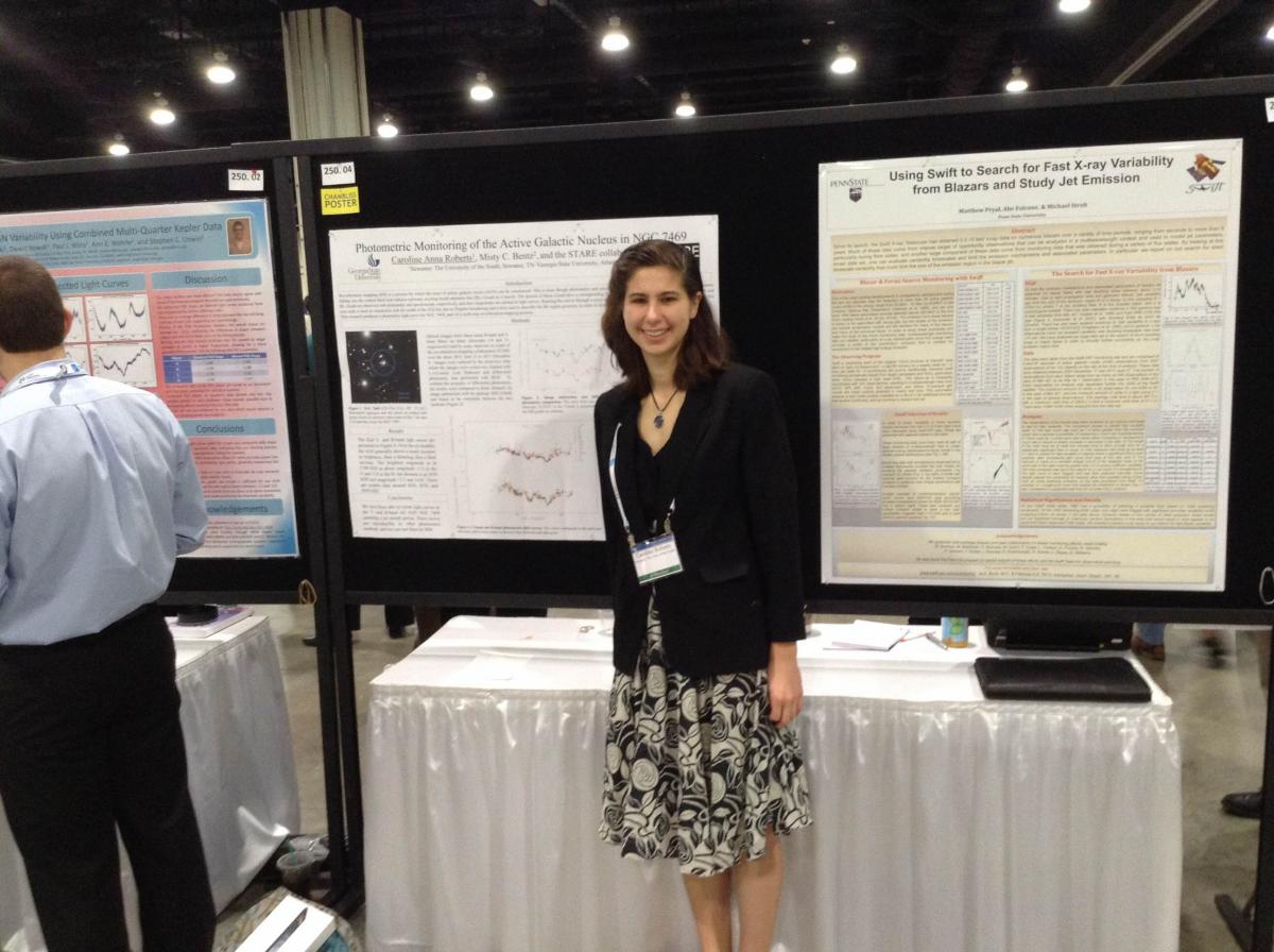The author with her poster at AAS.