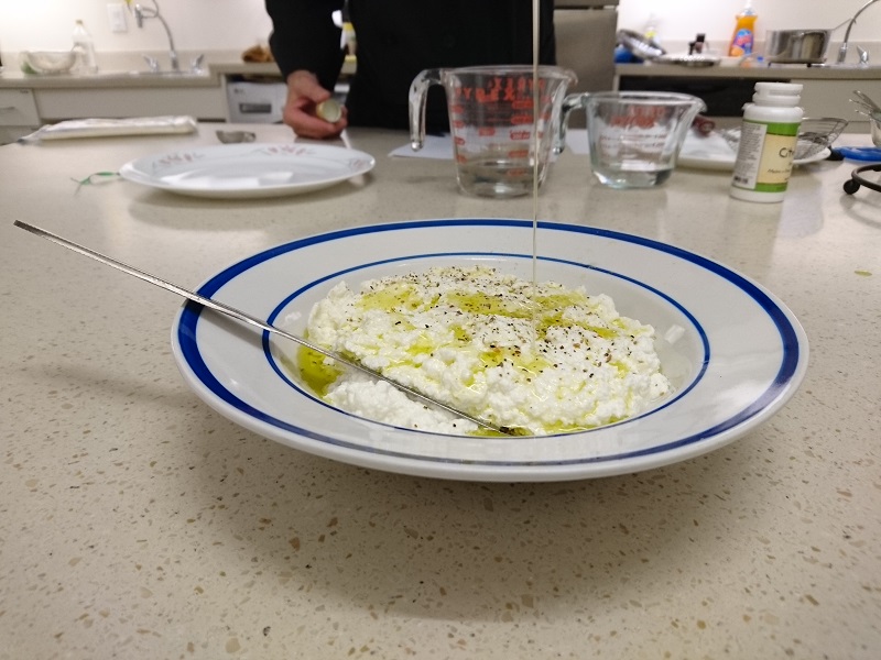 Ricotta Cheese with Olive Oil being Drizzled on Top