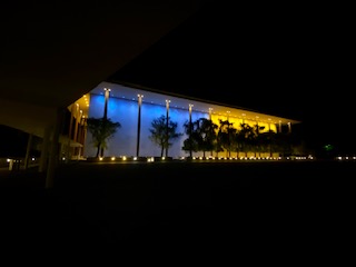 The Kennedy Center at night, with 'peeper' sounds in the background