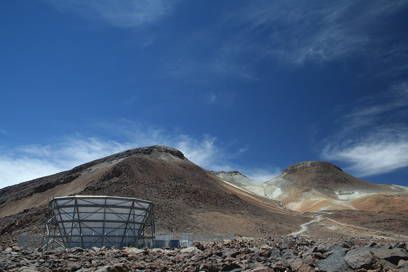 The Atacama Cosmology Telescope (ACT) is located at a high elevation on Cerro Toco in the Atacama Desert. Photo courtesy of the ACT Collaboration.