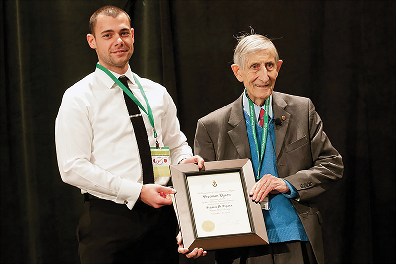 SPS Zone 9 associate zone councilor Brandon Clary (left) inducts Freeman Dyson (right) as an honorary member of Sigma Pi Sigma in 2012. Photo courtesy of SPS National.