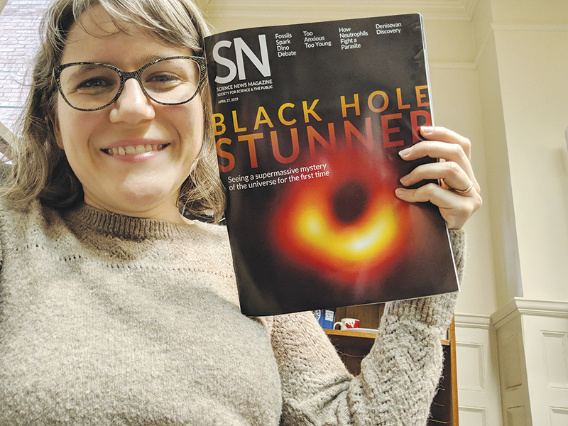 Emily Conover holds an issue of Science News magazine. Photo courtesy of Emily Conover.