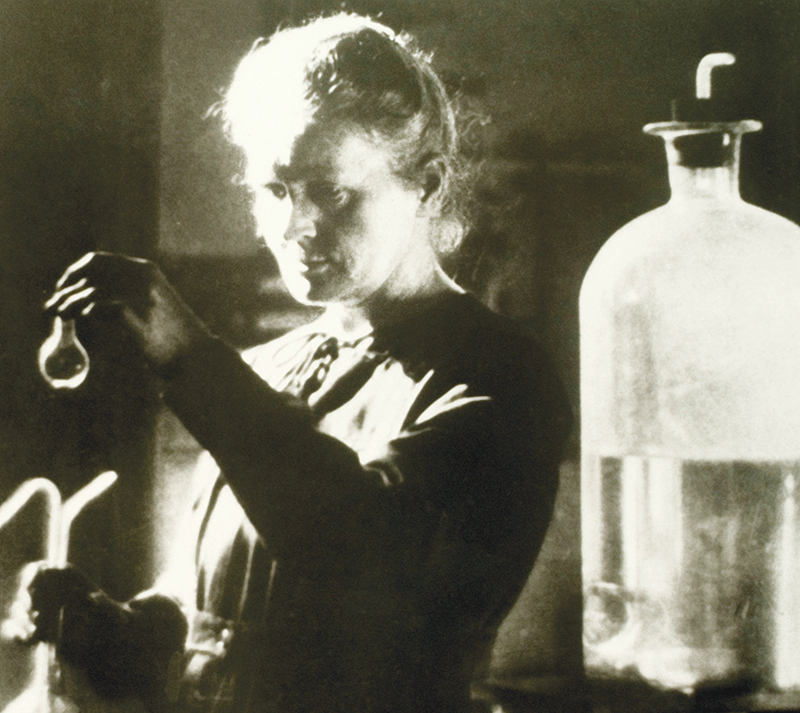Marie Curie in the laboratory. Image courtesy of the Curie Museum.