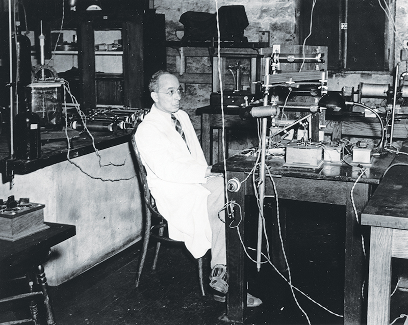 Portrait of Elmer Imes working in a laboratory. Image courtesy of the Fisk University Special Collections and Archives.