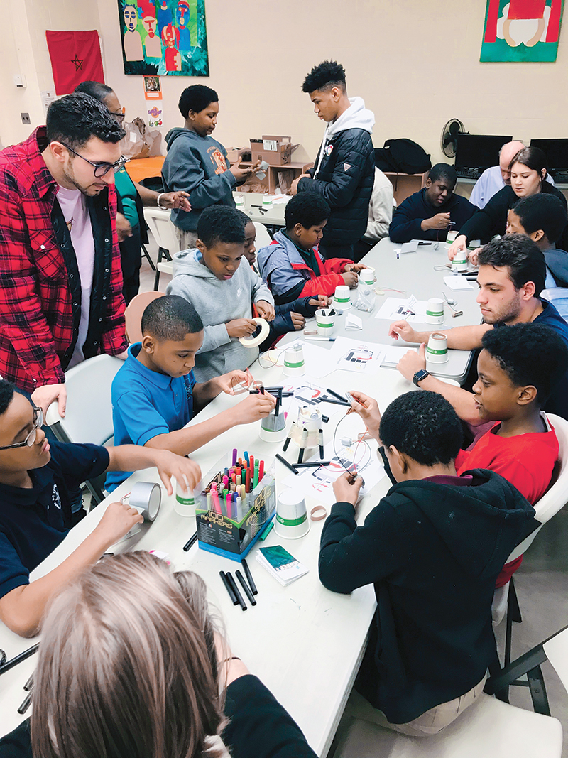 Students in the I CAN Science program create robots to learn about the functions of motors. Photo courtesy of Seneca Wells.