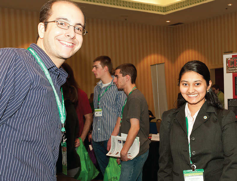 The author discusses GradSchoolShopper.com with a student at the 2012 Quadrennial Physics Congress in November 2012. Photo by Ken Cole.