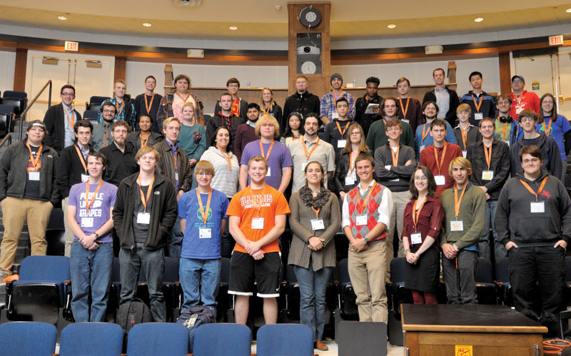 Attendees at the Zone 8 Meeting pause for a snapshot. Photo courtesy of the University of Illinois at Urbana-Champaign SPS chapter.