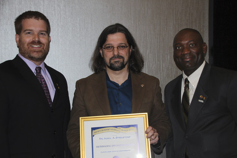 Kiril Streletzky (center) is pictured with Sigma Pi Sigma president Willie Rockward (right) and SPS Director Sean Bentley (left). Photo by Courtney Lemon.
