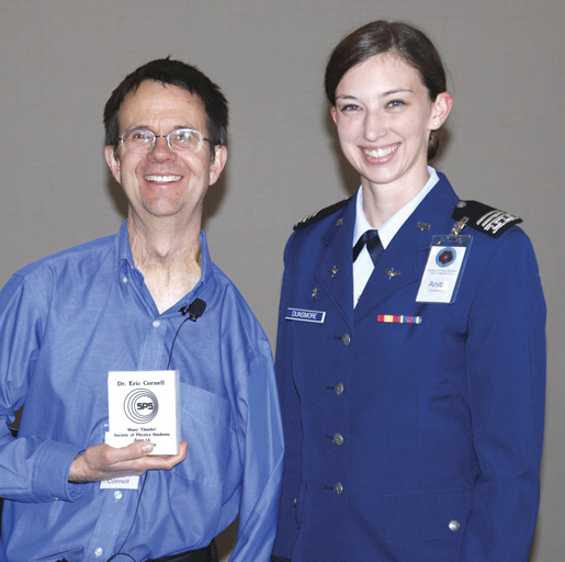 Cadet First Class and SPS President Anita Dunsmore poses with Dr. Cornell after presenting him with an engraved marble plaque, cut from stones that once outlined the cadet marching areas. Photo courtesy of United States Air Force Academy.