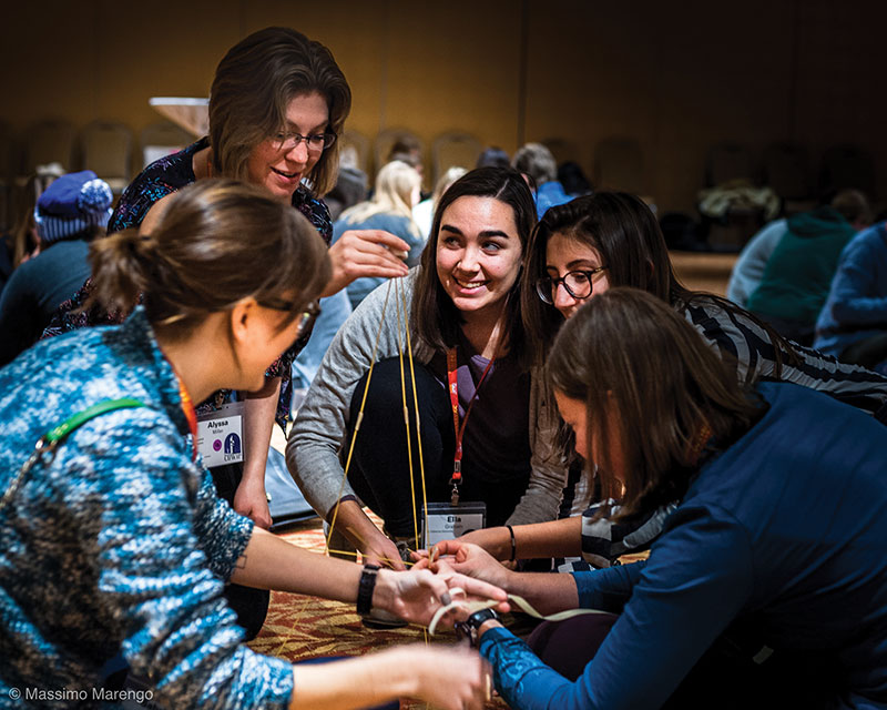 On the first night of the conference, attendees engaged in an icebreaker challenge. Groups of five were tasked with building a pasta tower to support a marshmallow without breaking or falling. 