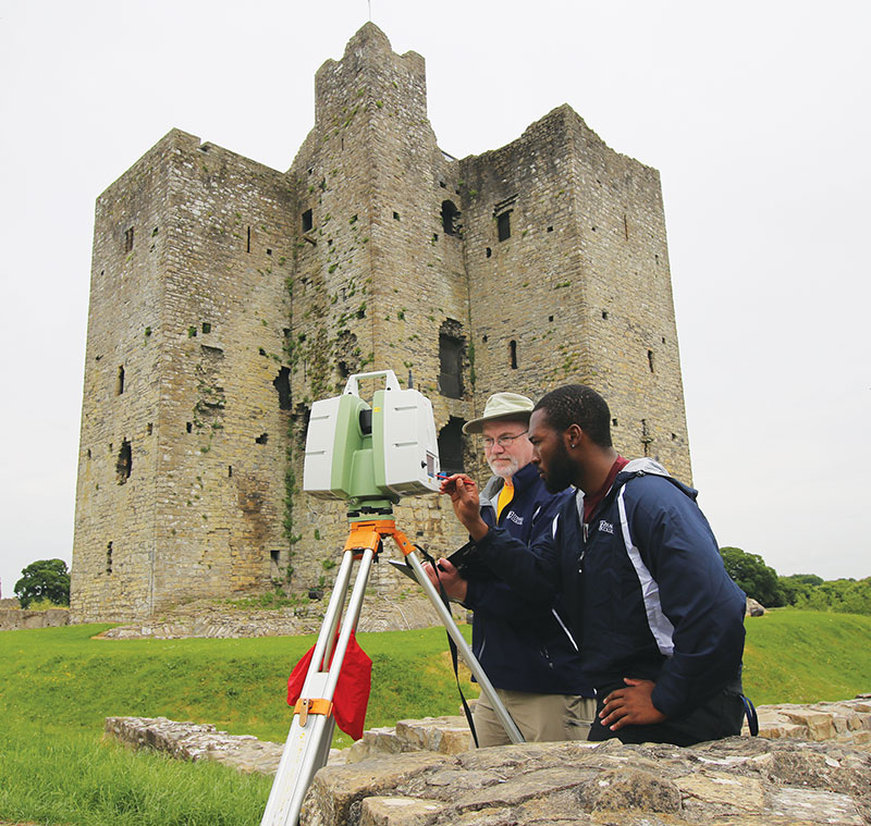 Professor Rogers and physics major Chidi Anyata using a Leica C10 3-D laser scanner to digitally preserve the Keep at Trim Castle in Ireland. Trim Castle is the largest Anglo-Norman castle in Ireland, and the Ithaca College team conducted two month-long summer expeditions to take positional readings every 5 mm inside and outside of the Keep, the Barbican Gate, the Curtain Wall, and the surrounding medieval landscape.  Photo courtesy of Professor Rogers.
