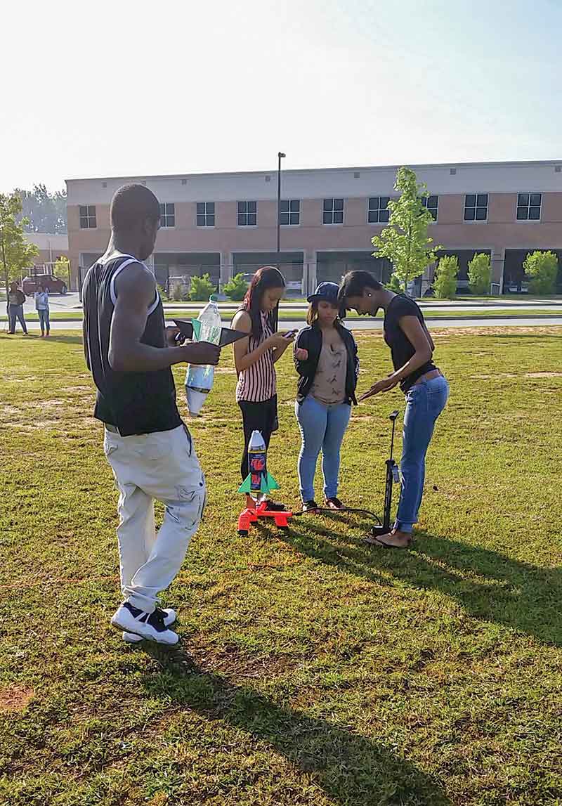 Physical science students testing their rockets. Photo courtesy of Kayla Stephens.
