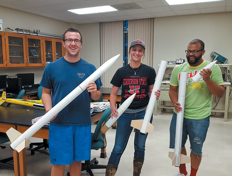 Cooper Wade, Becca Voss, and Josh Jasper build Loc Precision H45 rockets for their level-1 certification. Photo courtesy of Shannon Clardy.