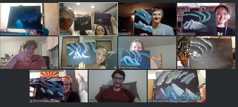 University of Denver SPS chapter members show off the aurora borealis masterpieces they painted during a virtual Bob Ross Painting Night. 