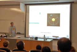 Dr. Aaron Titus teaches students and AAPT members about the orbit of Mars via computer simulation.