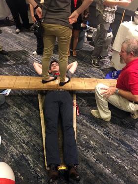 The Fresno State SPS chapter demonstrates the bed of nails.