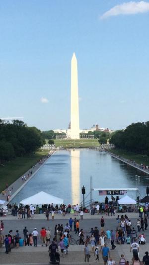 Washington Monument with reflection behind rally.