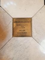 Brass plaque commemorating the location of Abraham Lincolns desk. Plate states &quot;Abraham Lincoln, Representative from Illinois, 1847-1849, Desk Location&quot;