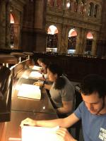 The four of us sitting at the Library of Congress Reading Room desks.