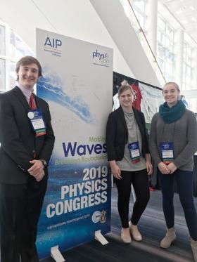 From left, 2019 PhysCon reporters Daniel Wilson, Ahnika Boring, and Genevieve Nelson. Photo courtesy of the Wheaton College PhysCon reporters.
