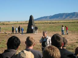 Worth Seagondollar speaks at Trinity Site in New Mexico. Photo by Tracy Nolis-Schwab.