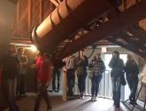 Students at Lowell Observatory touring the telescope used to discover Pluto.