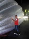 Sandeep poses with one of Project Loon's balloons. Photo courtesy of the author.
