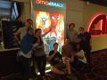 The Spider-Man crew in front of the movie poster